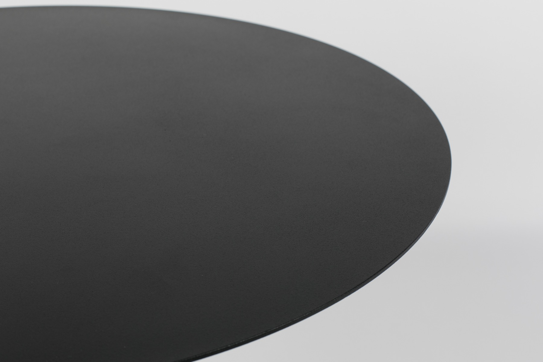 Minimal black round table
