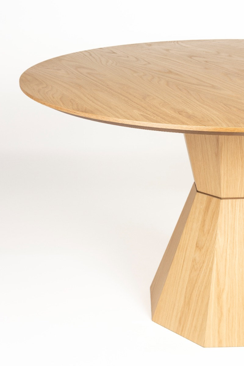 Round wooden dining table with chunky pedestal base