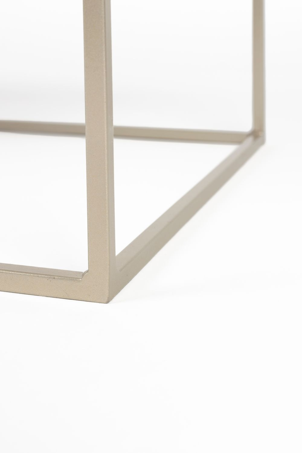 Rectangular coffee table with light wood top and metal frame in showroom