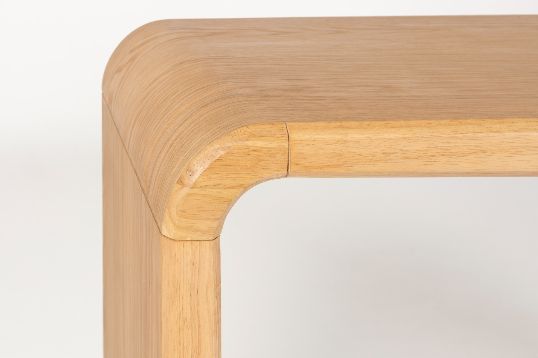 Close-up of curved bench leg and joint